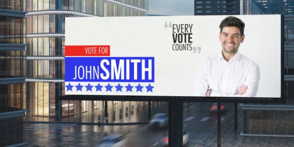Large digital billboard in an urban area displaying a political campaign ad with the message 'Every Vote Counts'.