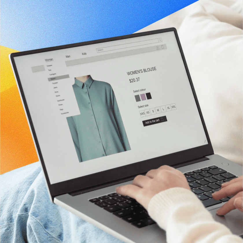Laptop displaying an online clothing product page with size and color options.