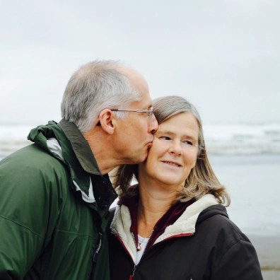 An older couple by the sea shore