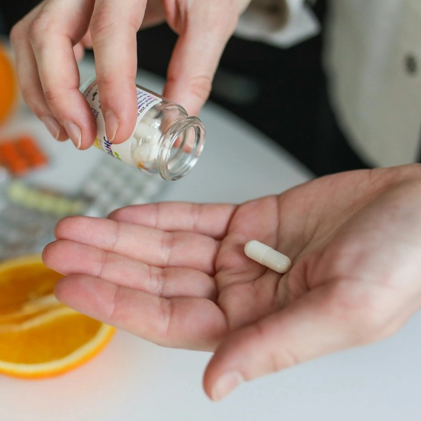 Person taking a supplement