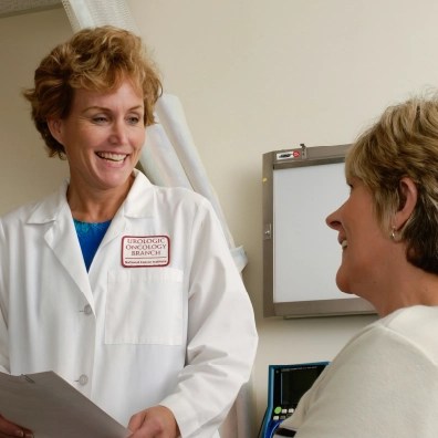Oncologist speaking with a patient