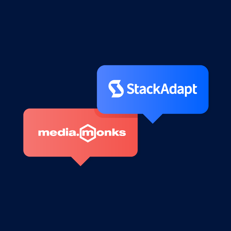 Illustrative graphic of two speech bubbles, one red and one blue, one with media.monks' logo and one with StackAdapt's.