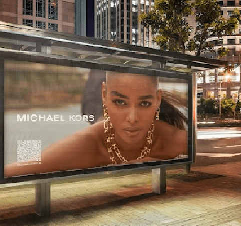 Michael Kors Jewelry DOOH ad on a transit stop
